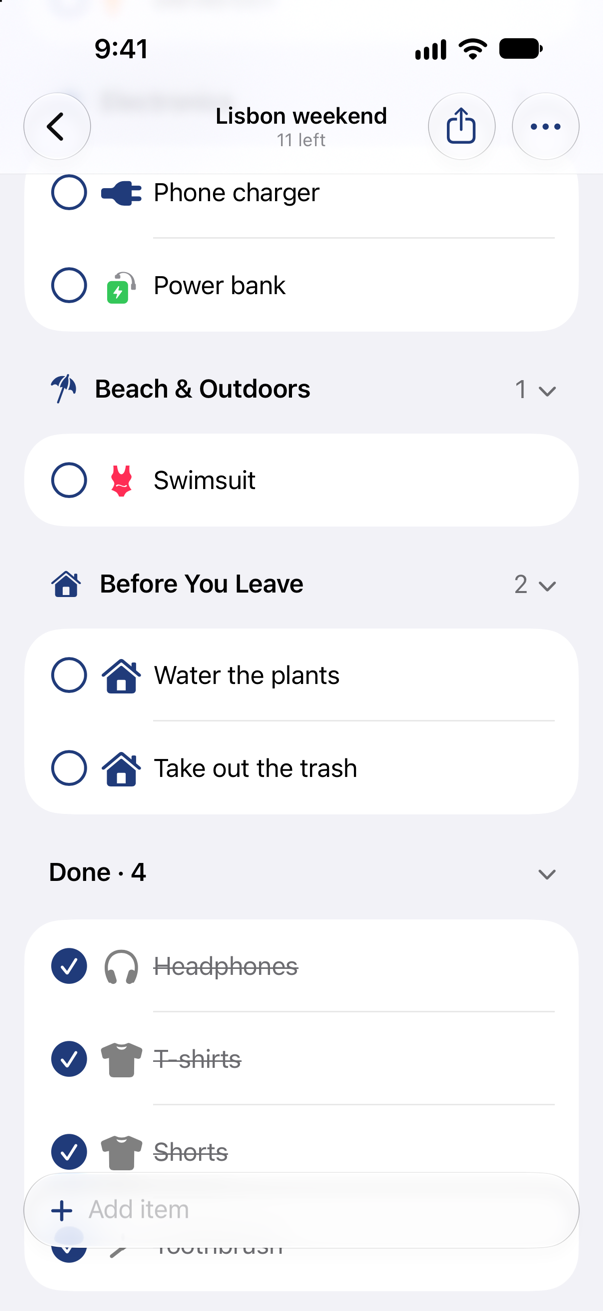 A Travel list called Lisbon weekend on iPhone: a swimsuit, 2 to-dos under Before You Leave and 4 things checked off.